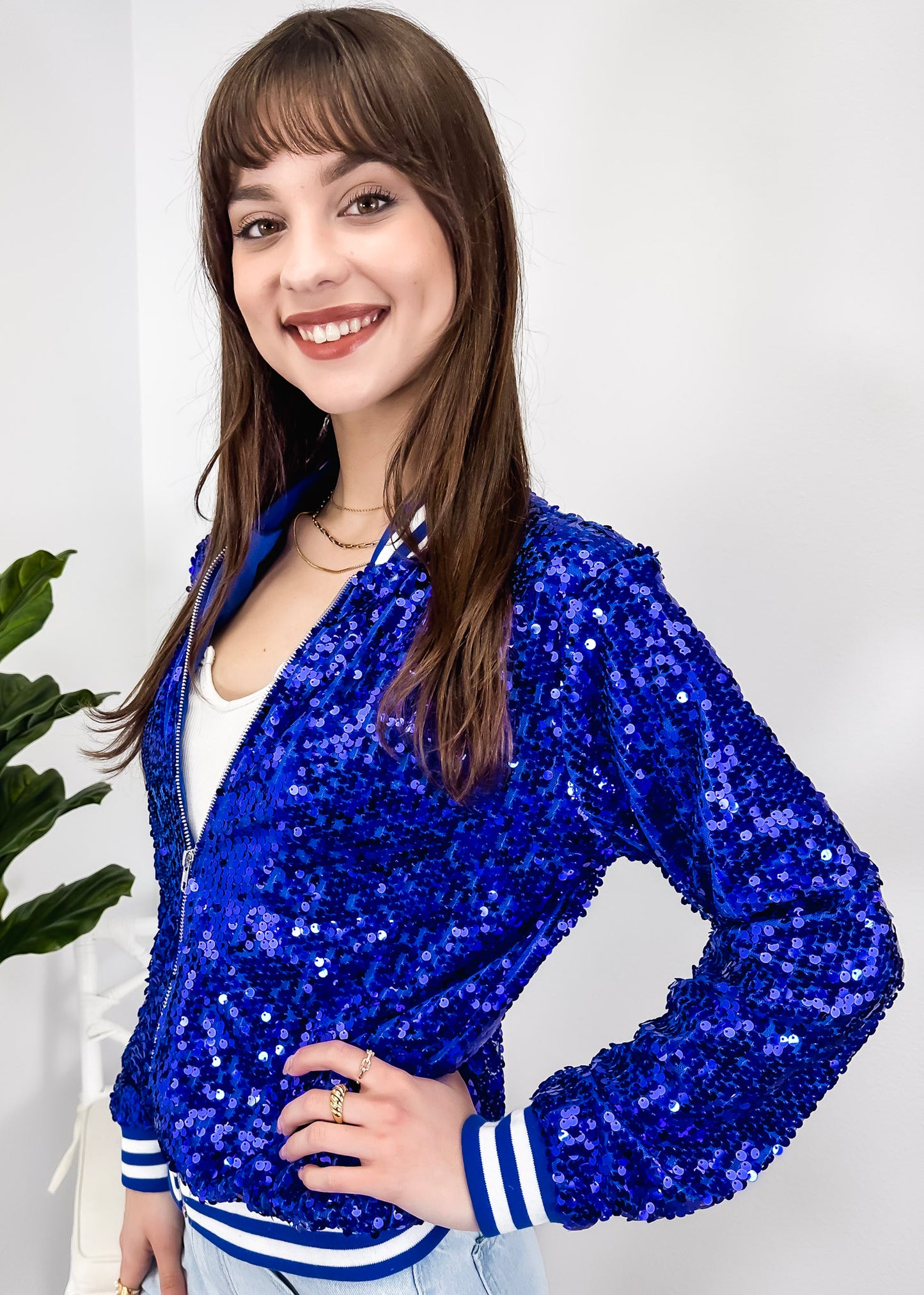 Chaqueta universitaria con lentejuelas metálicas a rayas