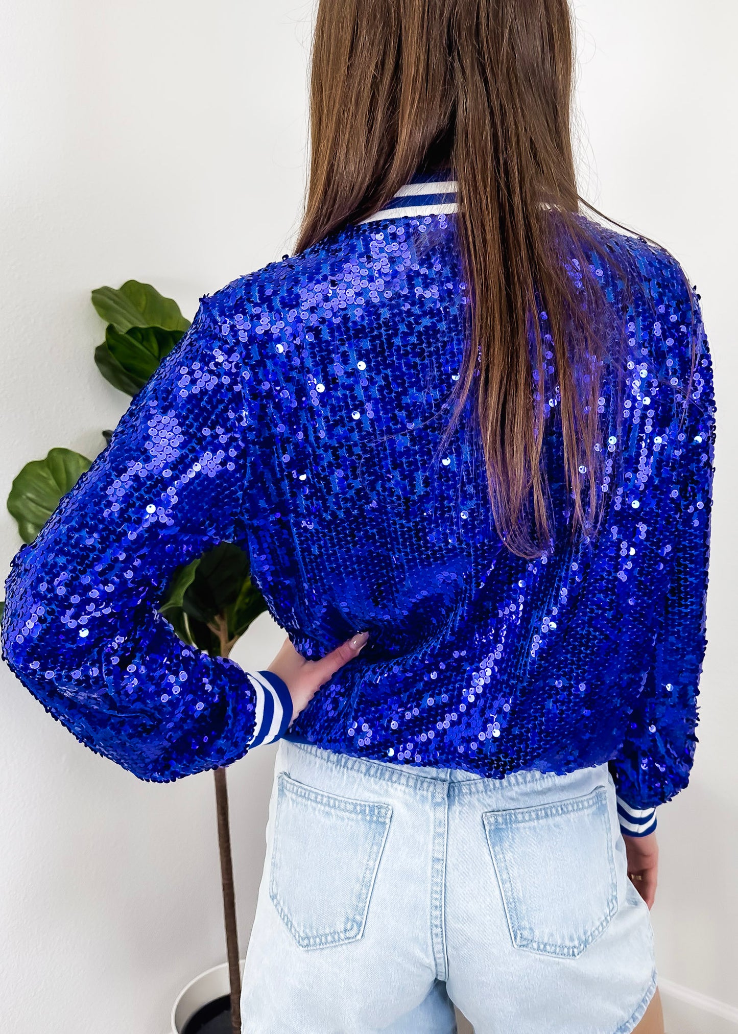 Chaqueta universitaria con lentejuelas metálicas a rayas