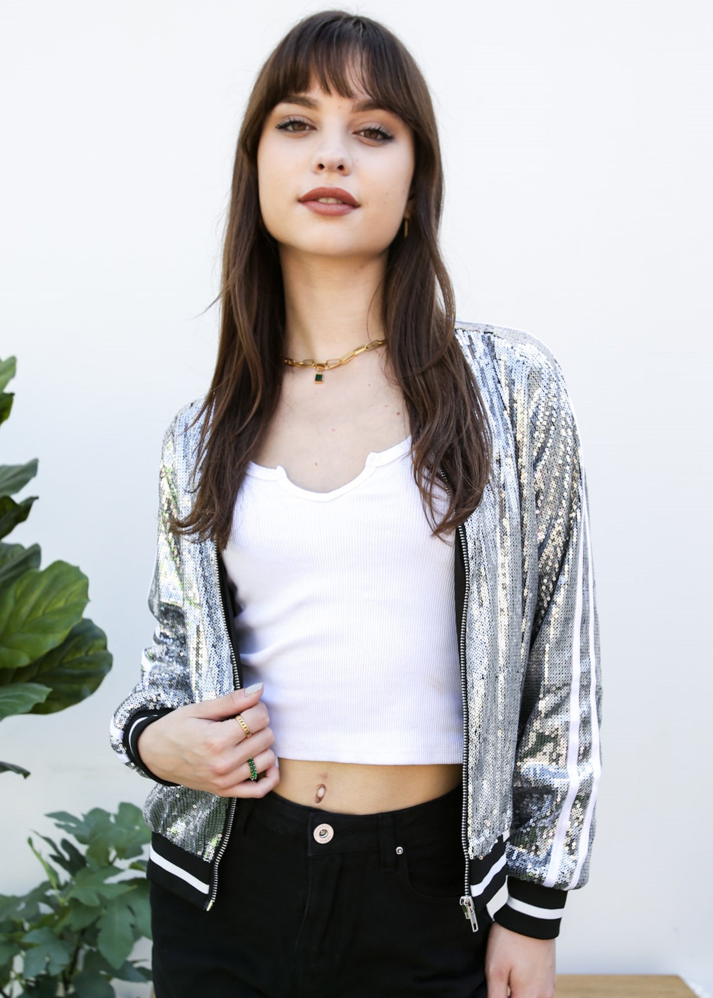 Chaqueta universitaria con lentejuelas metálicas a rayas