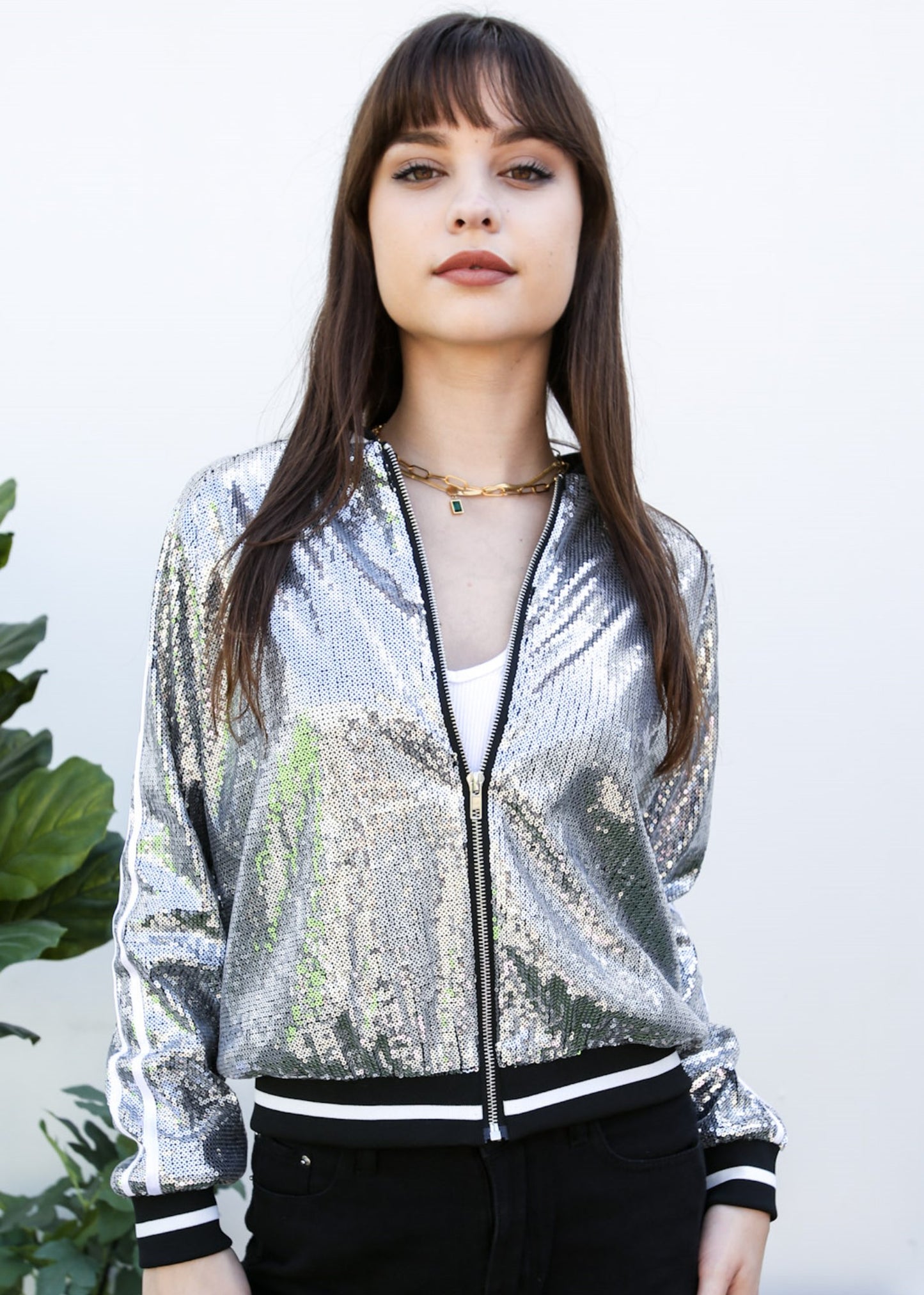 Chaqueta universitaria con lentejuelas metálicas a rayas