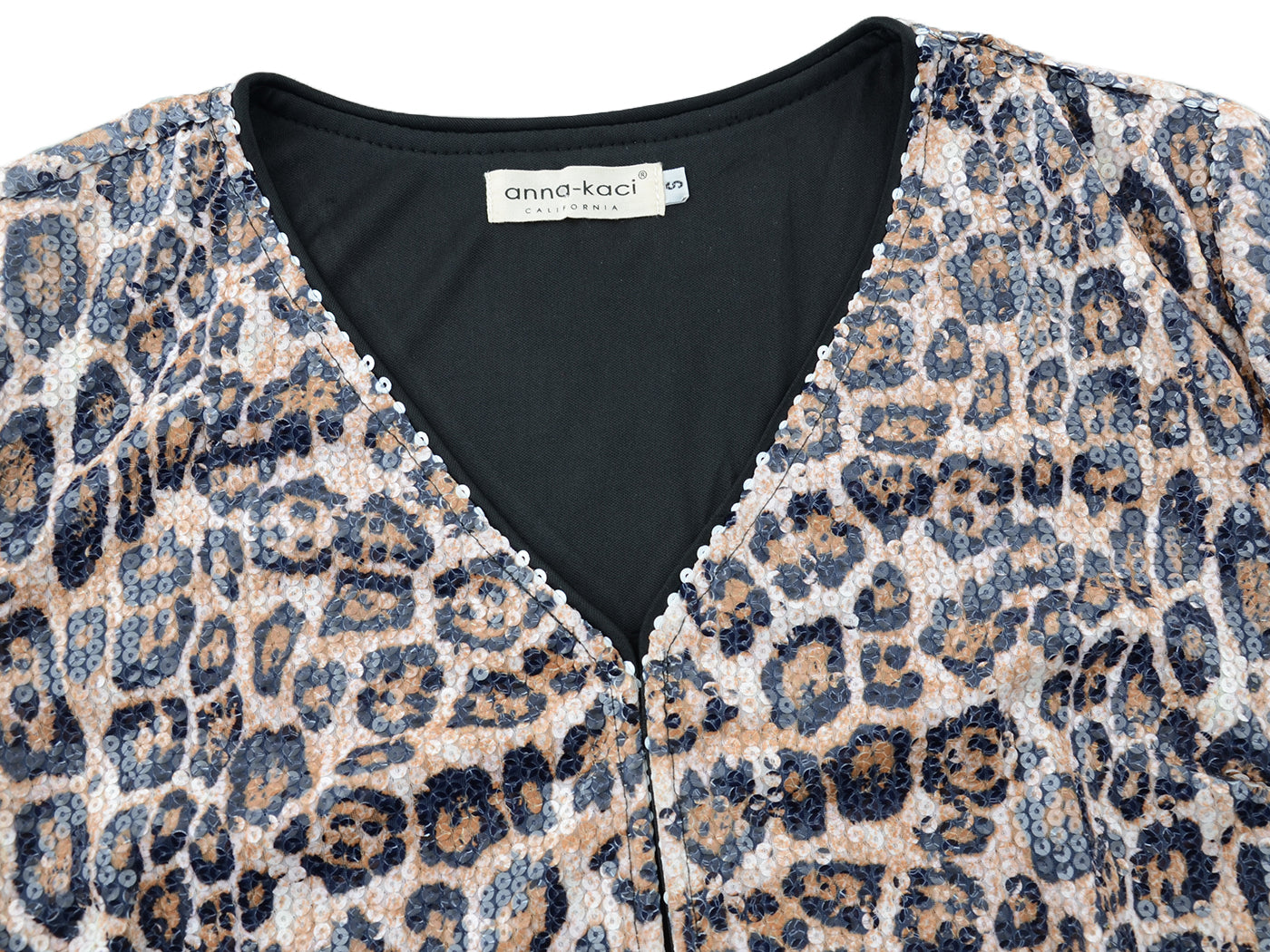 Chaqueta de cóctel con lentejuelas y parte delantera abierta
