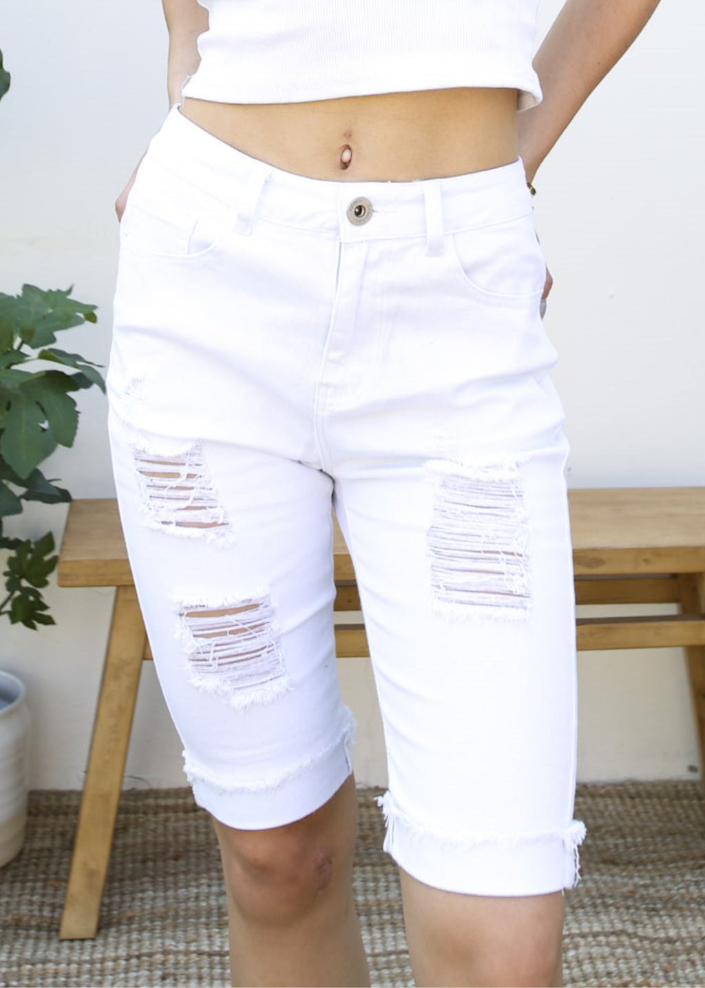 Pantalones cortos de mezclilla rotos con cintura alta