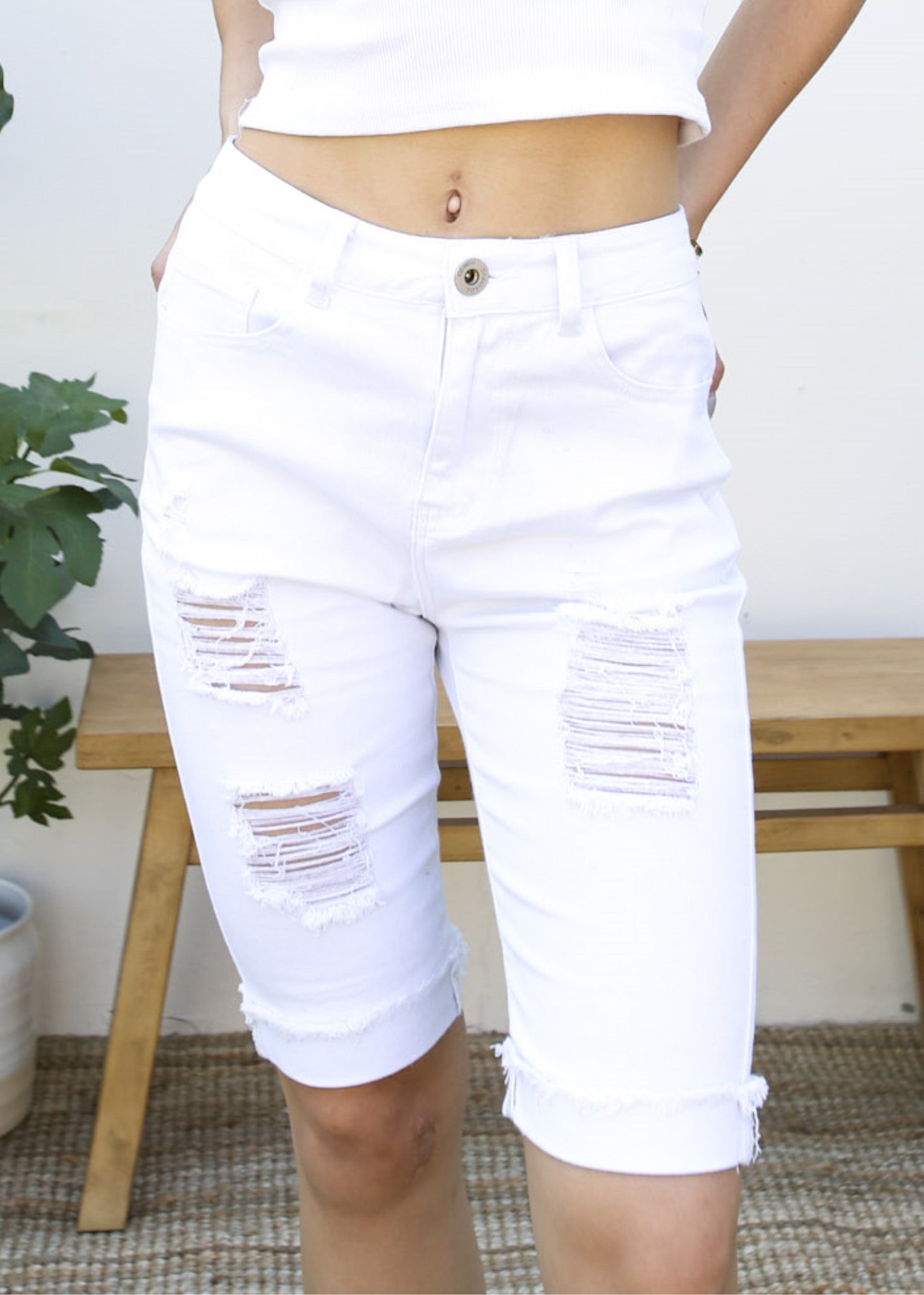 Pantalones cortos de mezclilla rotos con cintura alta