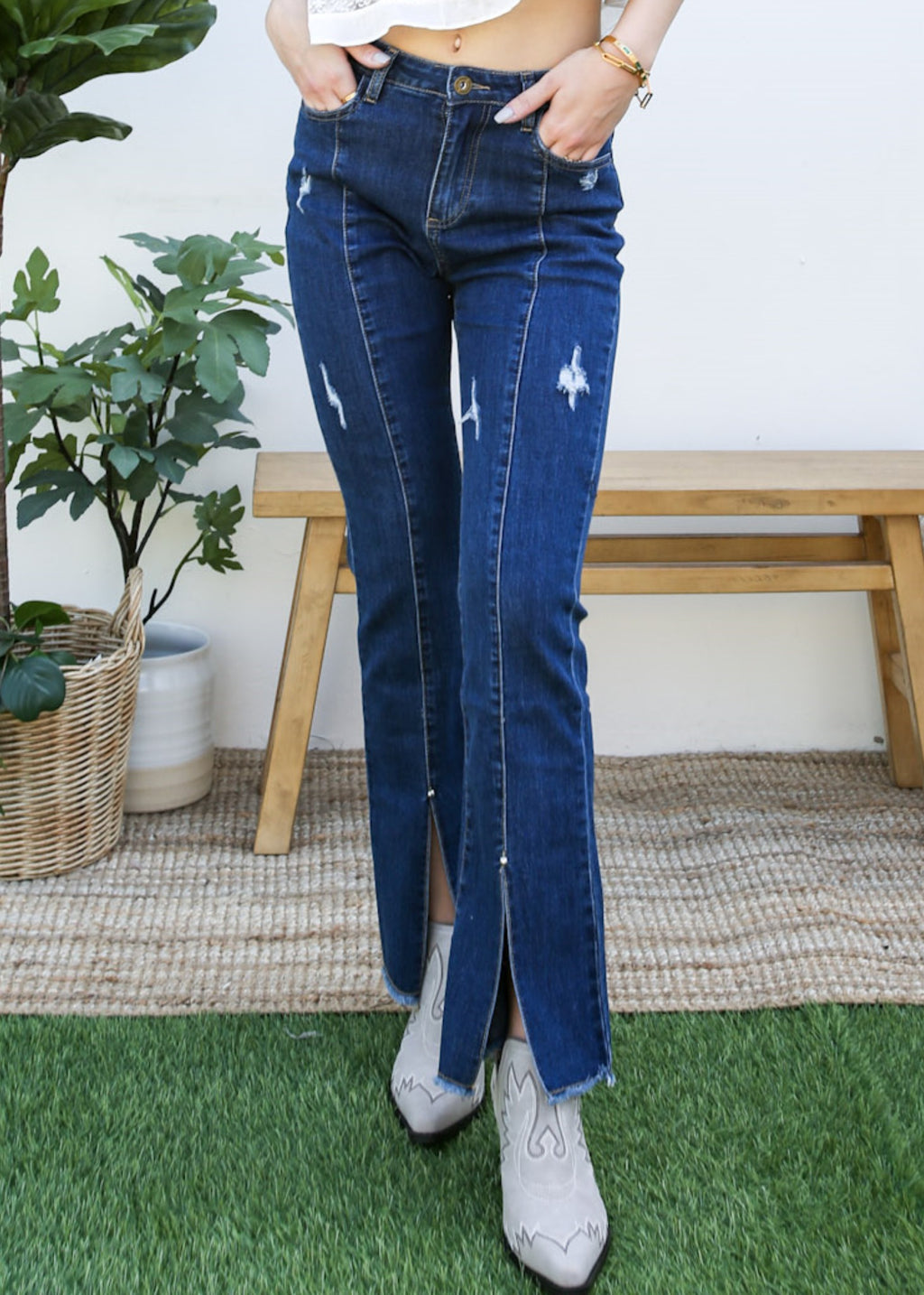 Pantalones vaqueros largos de mezclilla con abertura y cintura alta desgastada y bolsillos