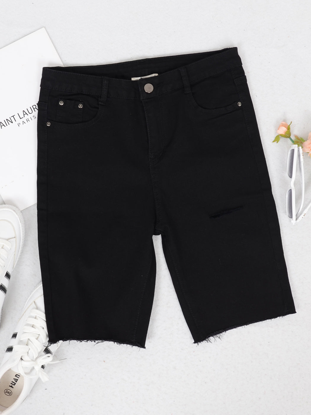 Pantalones cortos de mezclilla rotos con cintura alta