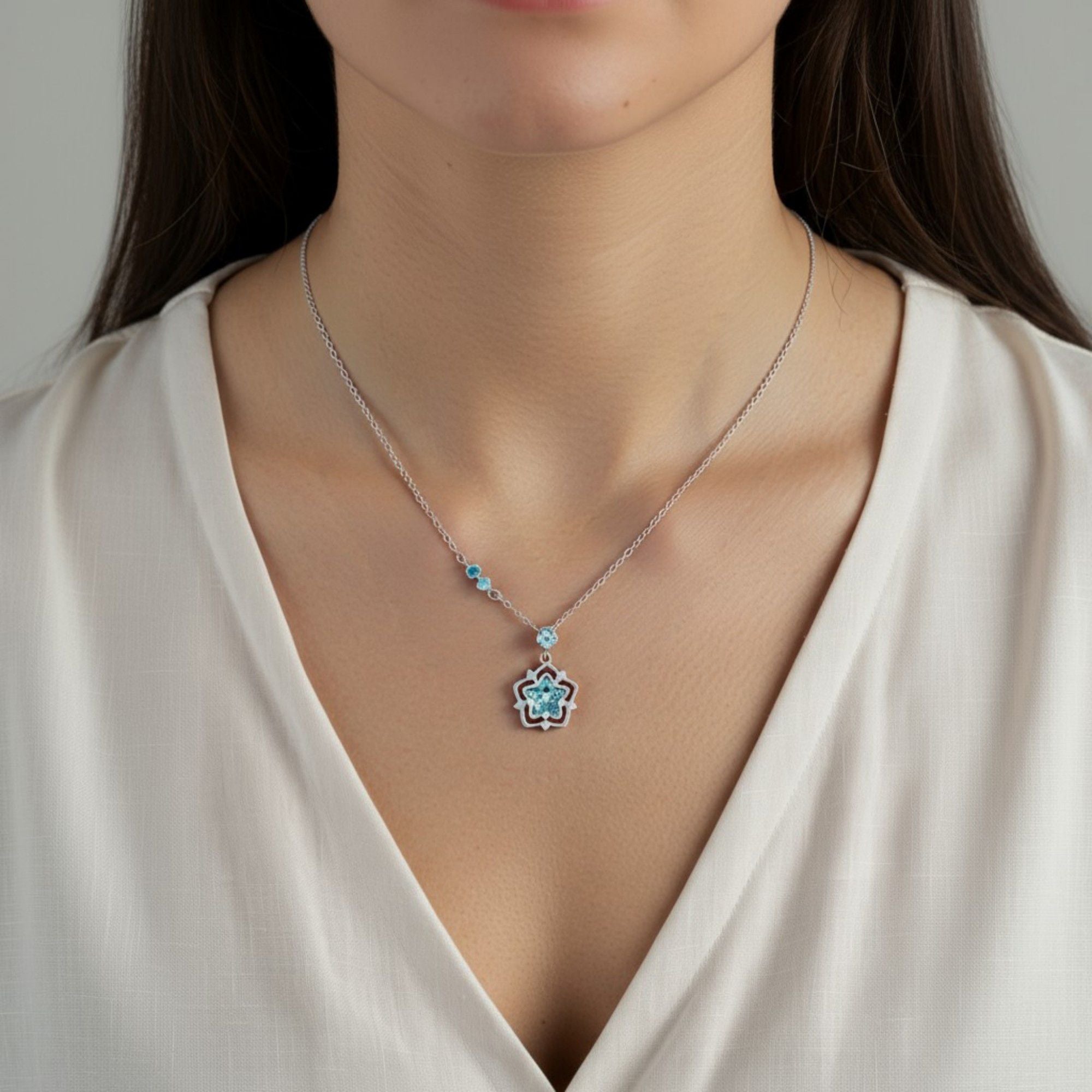 Women's Star Flower Pendant Necklace with Crystal Center Stone and Accent Gem Detailing