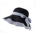 Blue women's sun hat with striped and bow