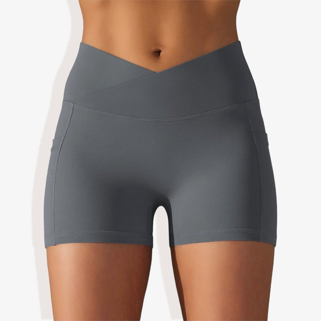 Pantalones cortos deportivos ajustados con cintura alta, bolsillos y banda en la cintura en forma de V