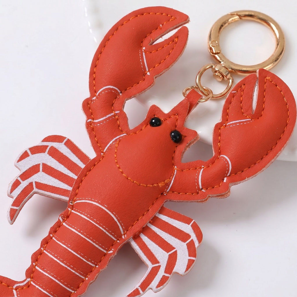 2-Piece Womens Faux Leather Padded Bag Charm with Gold Ring and Stitched Texture
