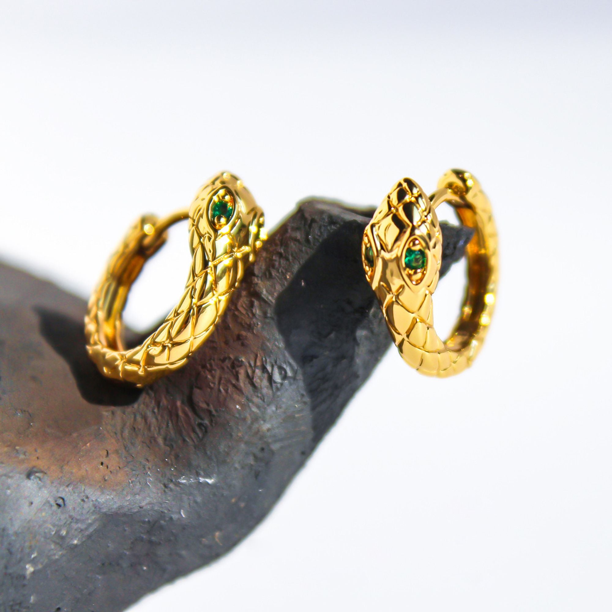 Snake-Shaped Hoop Earrings with Green Gem Eyes