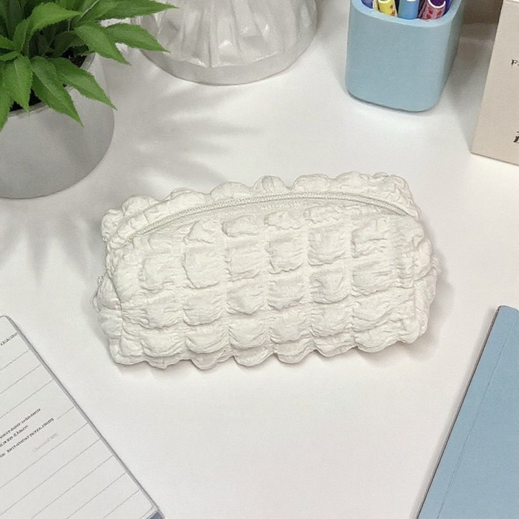 Whipped Cream-Inspired Zipper Pouch with Soft Sculpted Texture and Compact Storage Design