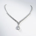Women's Rhinestone Necklace with Teardrop Crystal Pendant and V-Shaped Chain Design