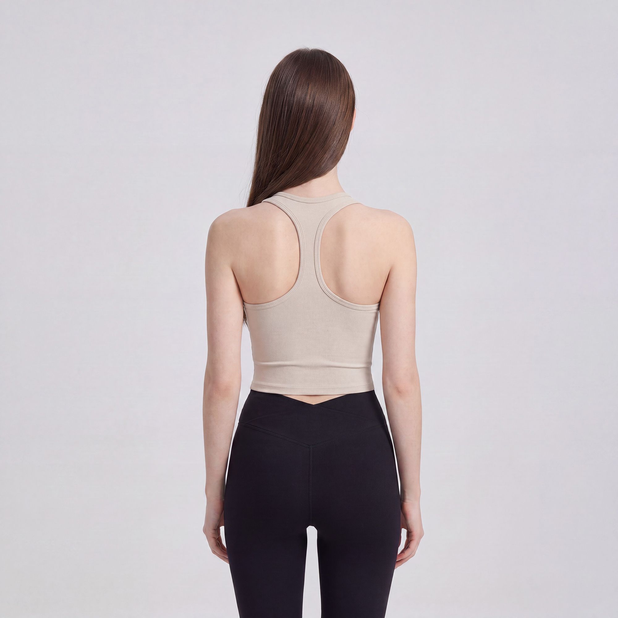 Sleeveless Yoga Tank Top with Built In Padding Scoop Neck Cutout Strap Detail and Fitted Activewear Silhouette