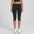 Blue women's leggings with cropped, high waist and side slit