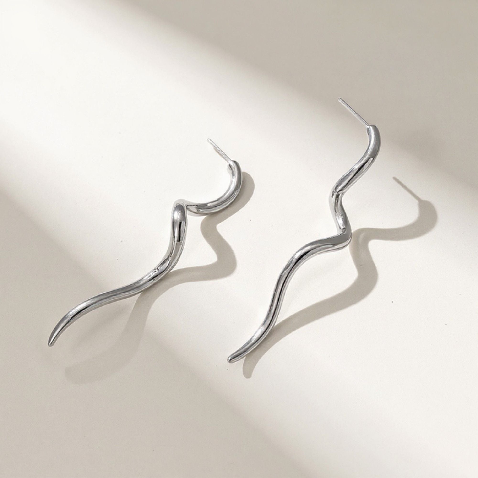 Wavy Metal Drop Earrings with Sculpted Curved Silhouette and Sleek Minimalist Design for a Modern Artistic Statement Look