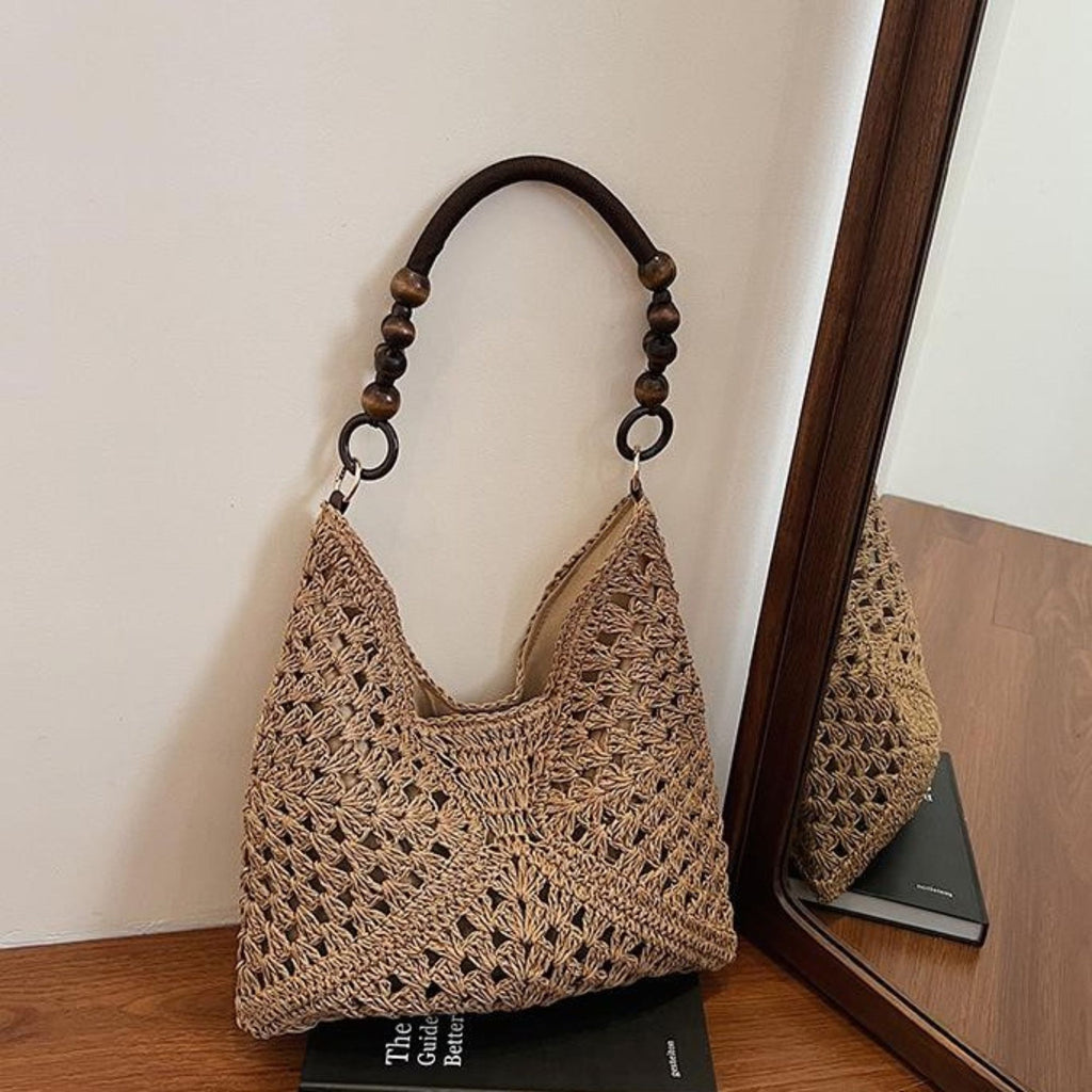 Woven Straw Hobo Bag with Wooden Handle Bead Accents and Spacious Interior