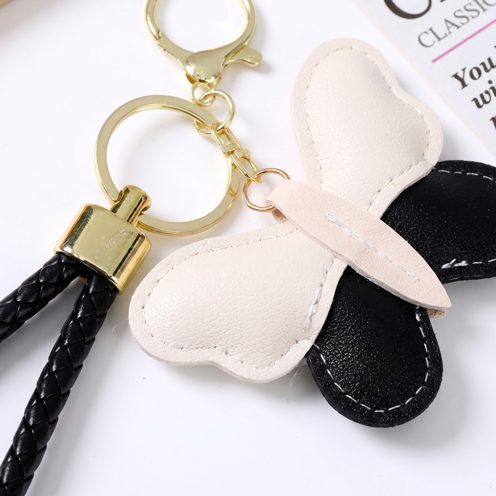 2-Piece Womens Faux Leather Bag Charm Keychain with Braided Wrist Strap and Gold Tone Ring
