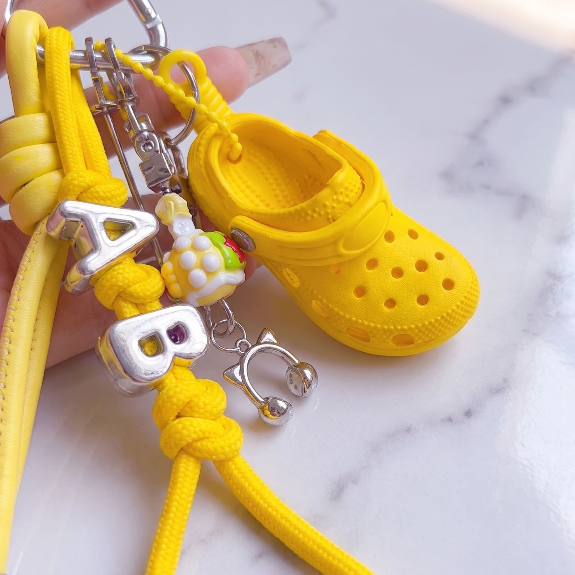 Multi-Charm Accessory with Hanging Clip and Letter Accents