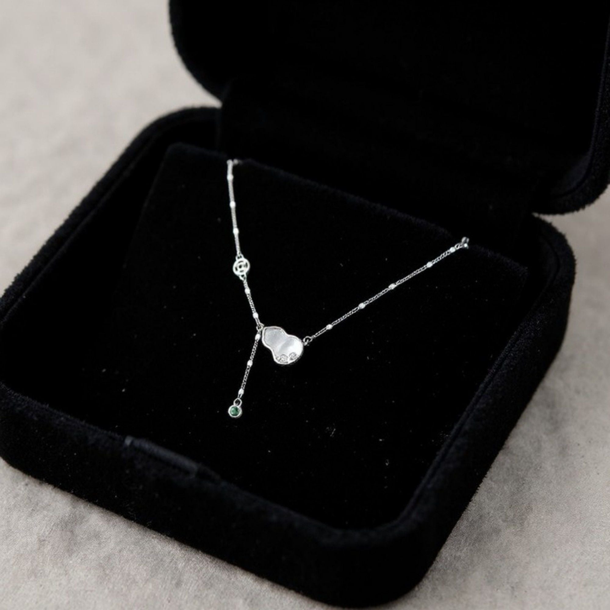 Women's Gourd Pendant Necklace with Drop Gem Accent and Delicate Chain Design