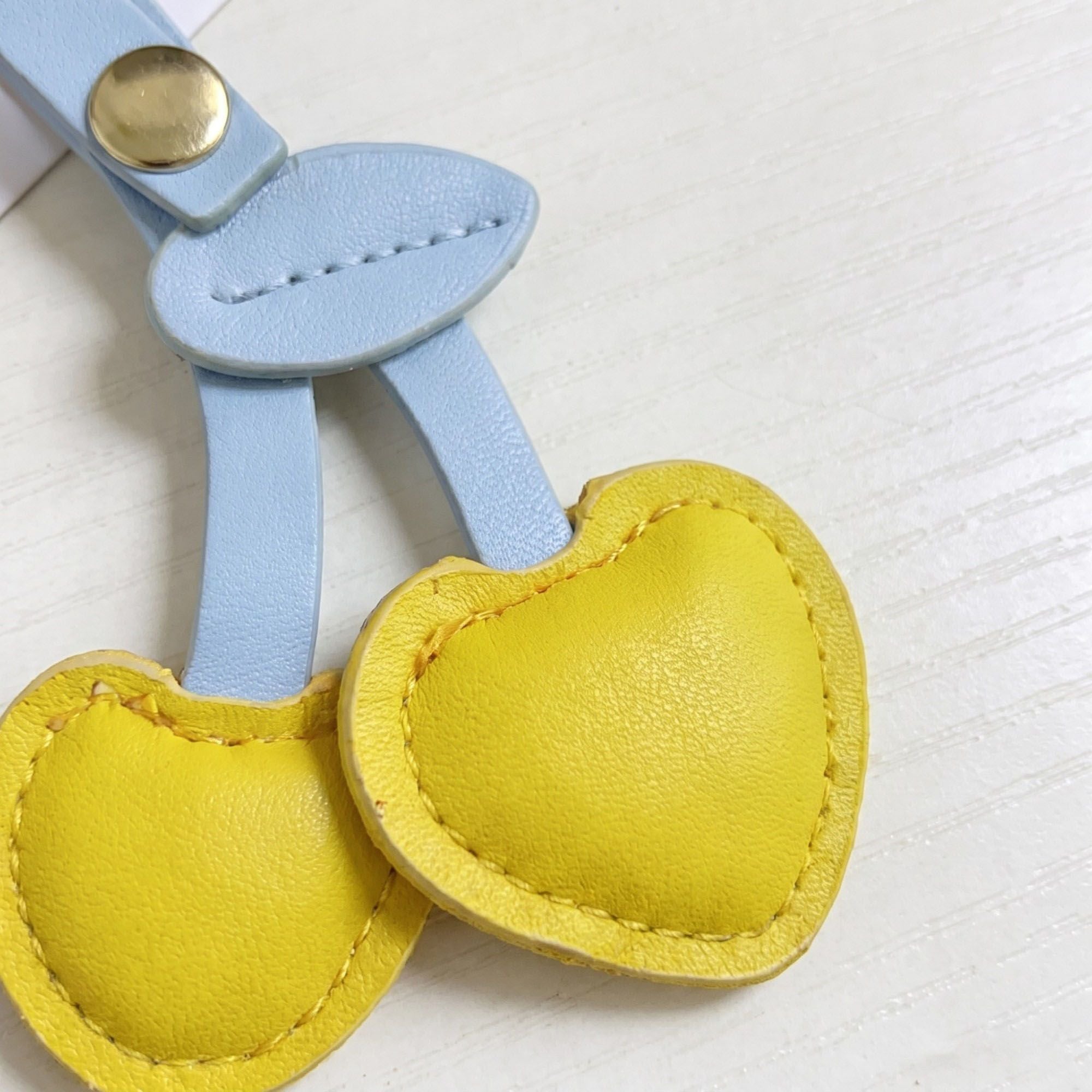 2-Piece Womens Padded Bag Charm with Hanging Strap and Stitched Detail