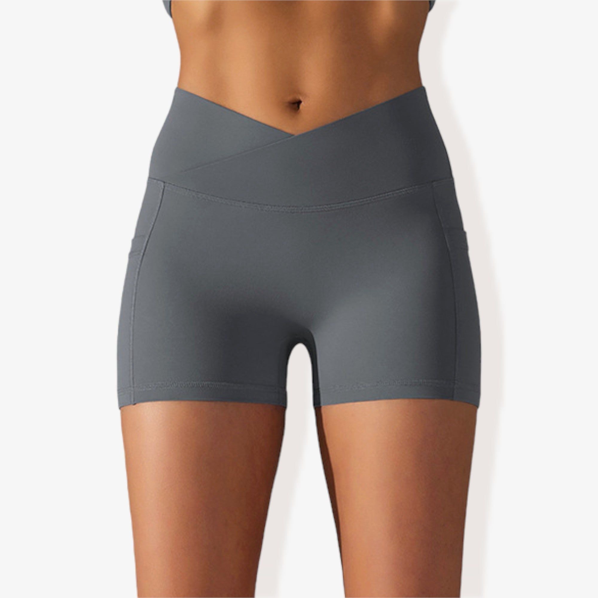 Pantalones cortos deportivos ajustados con cintura alta, bolsillos y banda en la cintura en forma de V