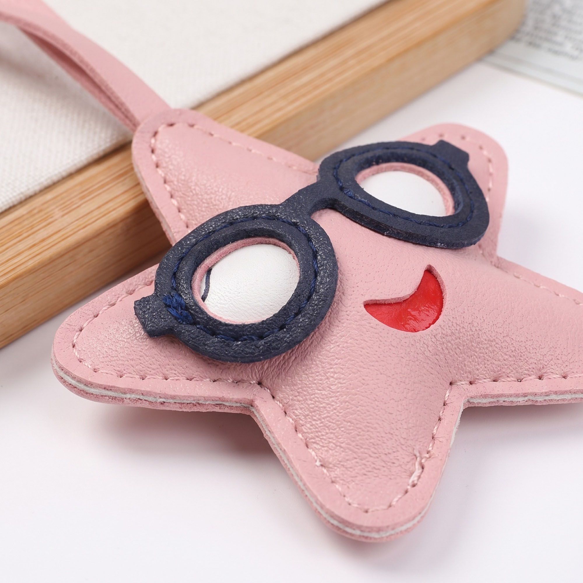 2-Piece Womens Faux Leather Bag Charm with Long Hanging Strap and Layered Detail