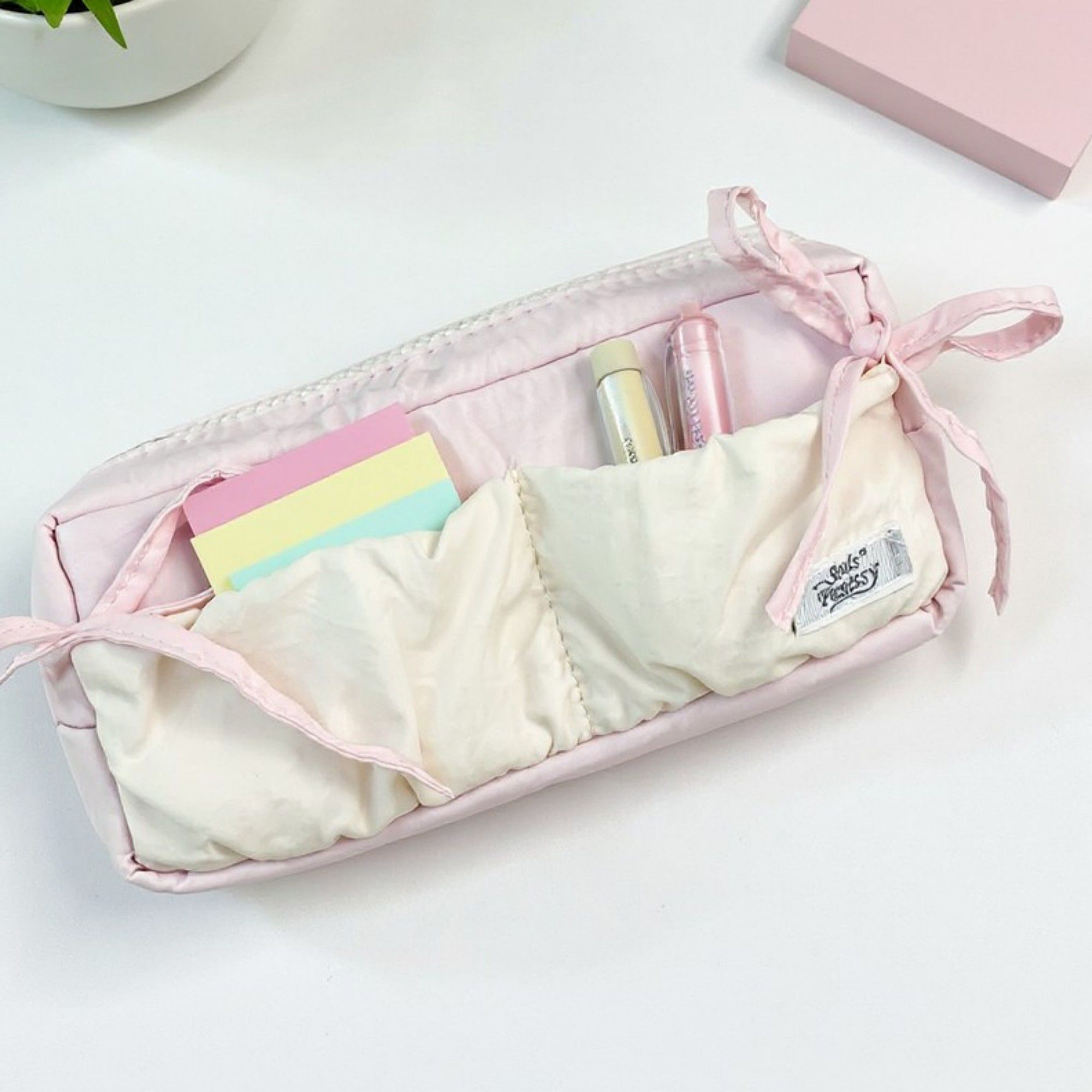 Ruffled Ribbon Zipper Pouch with Dual Compartments and Soft Quilted Texture