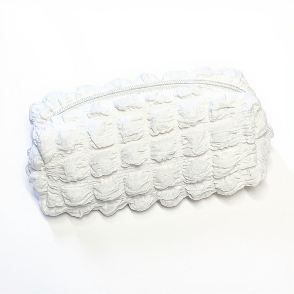 Whipped Cream-Inspired Zipper Pouch with Soft Sculpted Texture and Compact Storage Design