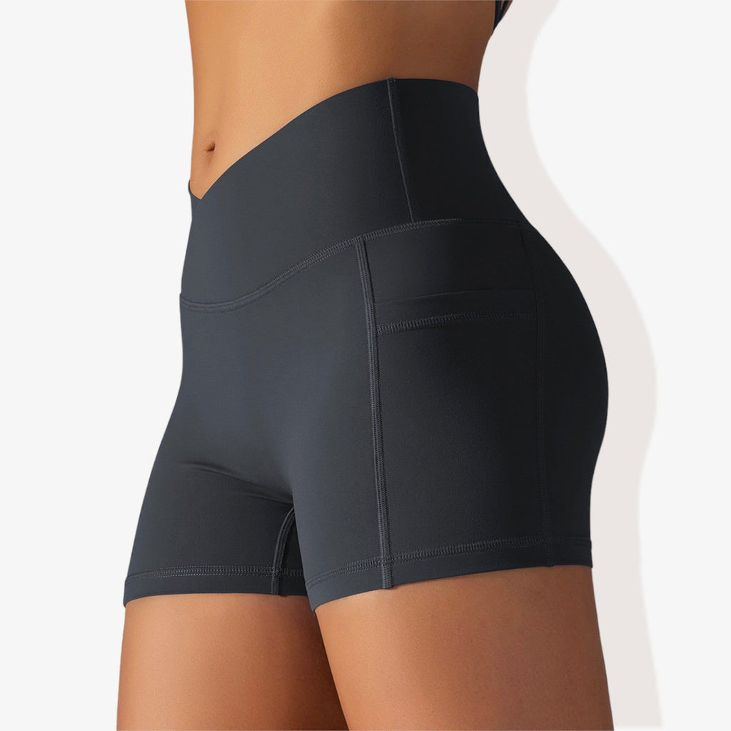 Pantalones cortos deportivos ajustados con cintura alta, bolsillos y banda en la cintura en forma de V