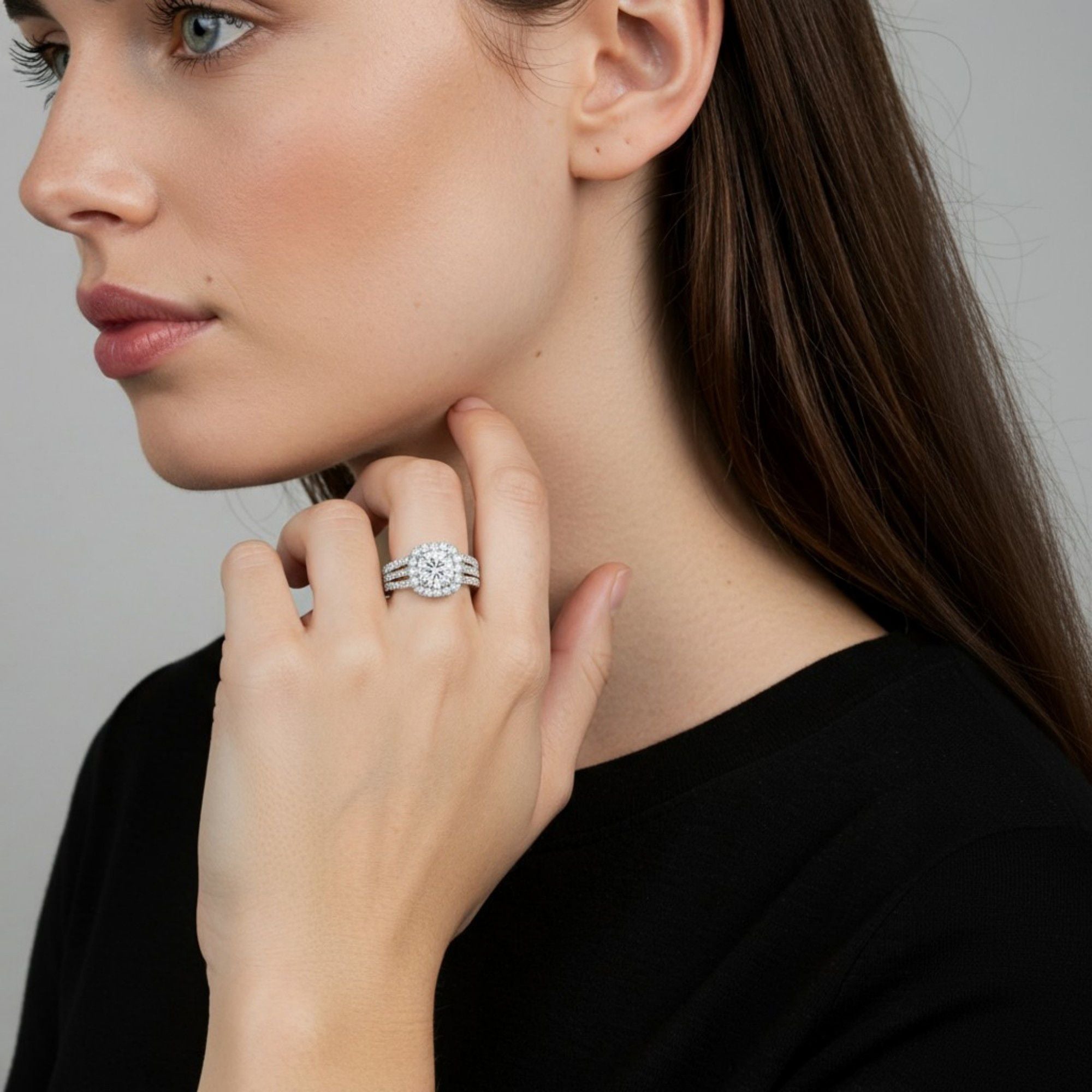 Women's Cushion Halo Engagement Ring with Round Cut Center Stone and Triple Band Design