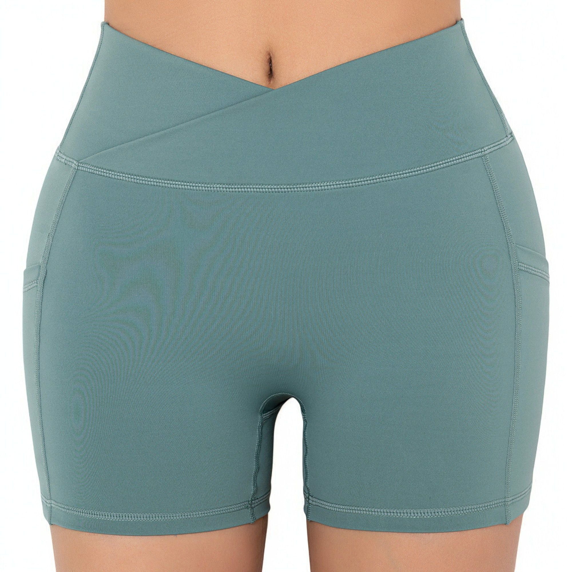 Pantalones cortos deportivos ajustados con cintura alta, bolsillos y banda en la cintura en forma de V
