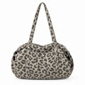 Leopard Print Barrel Shoulder Bag with Zip Closure and Interior Pockets