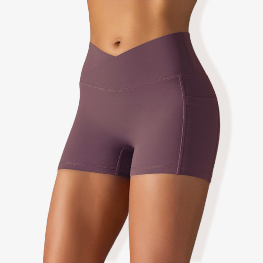Pantalones cortos deportivos ajustados con cintura alta, bolsillos y banda en la cintura en forma de V