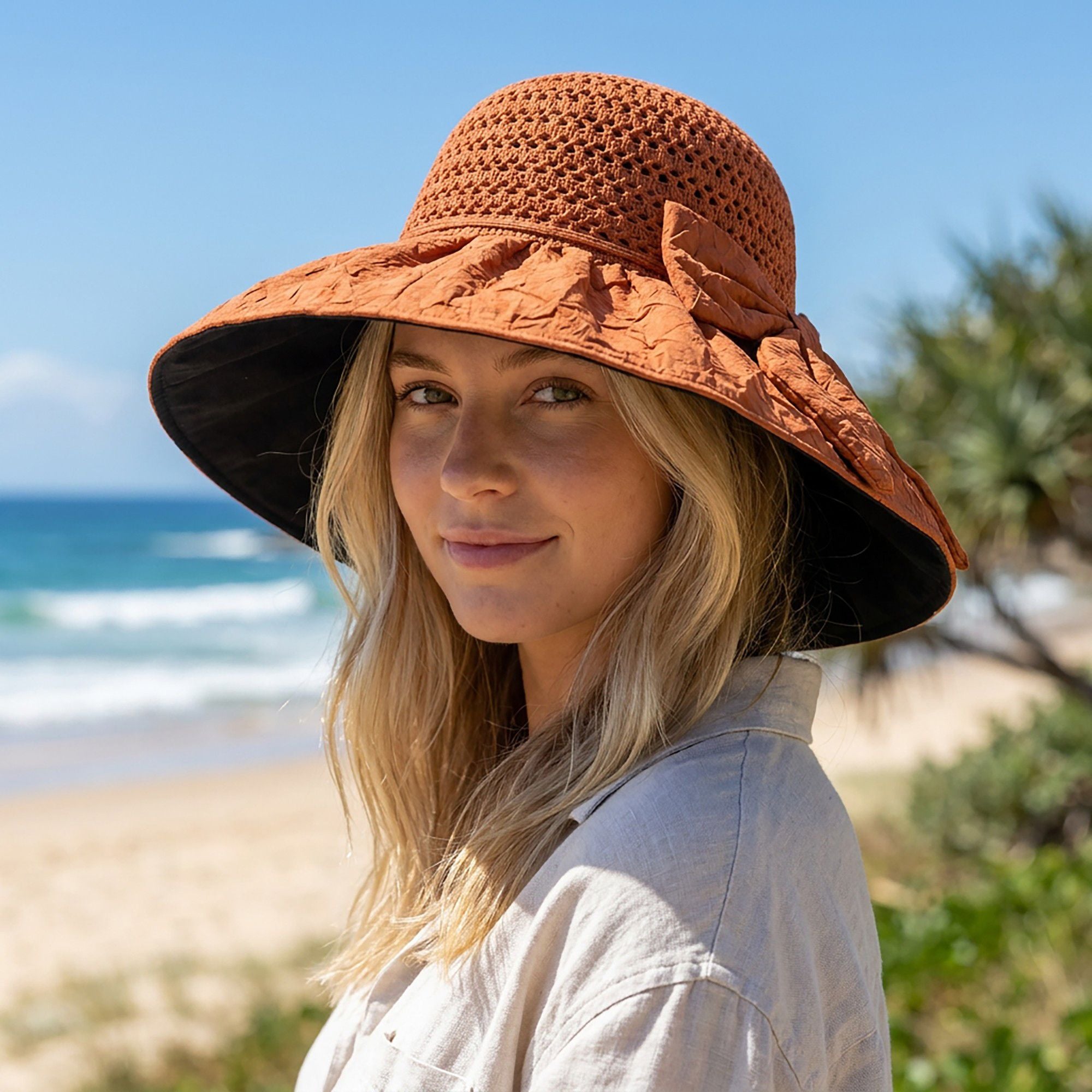 Wide Brim Crochet Sun Hat with Bow Accent and Textured Fabric Brim