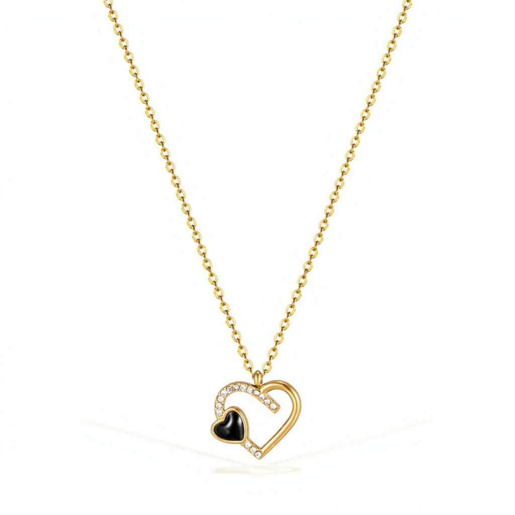 Interlocking Heart Pendant Necklace with Crystal Accents and Polished Metal Design on a Delicate Chain