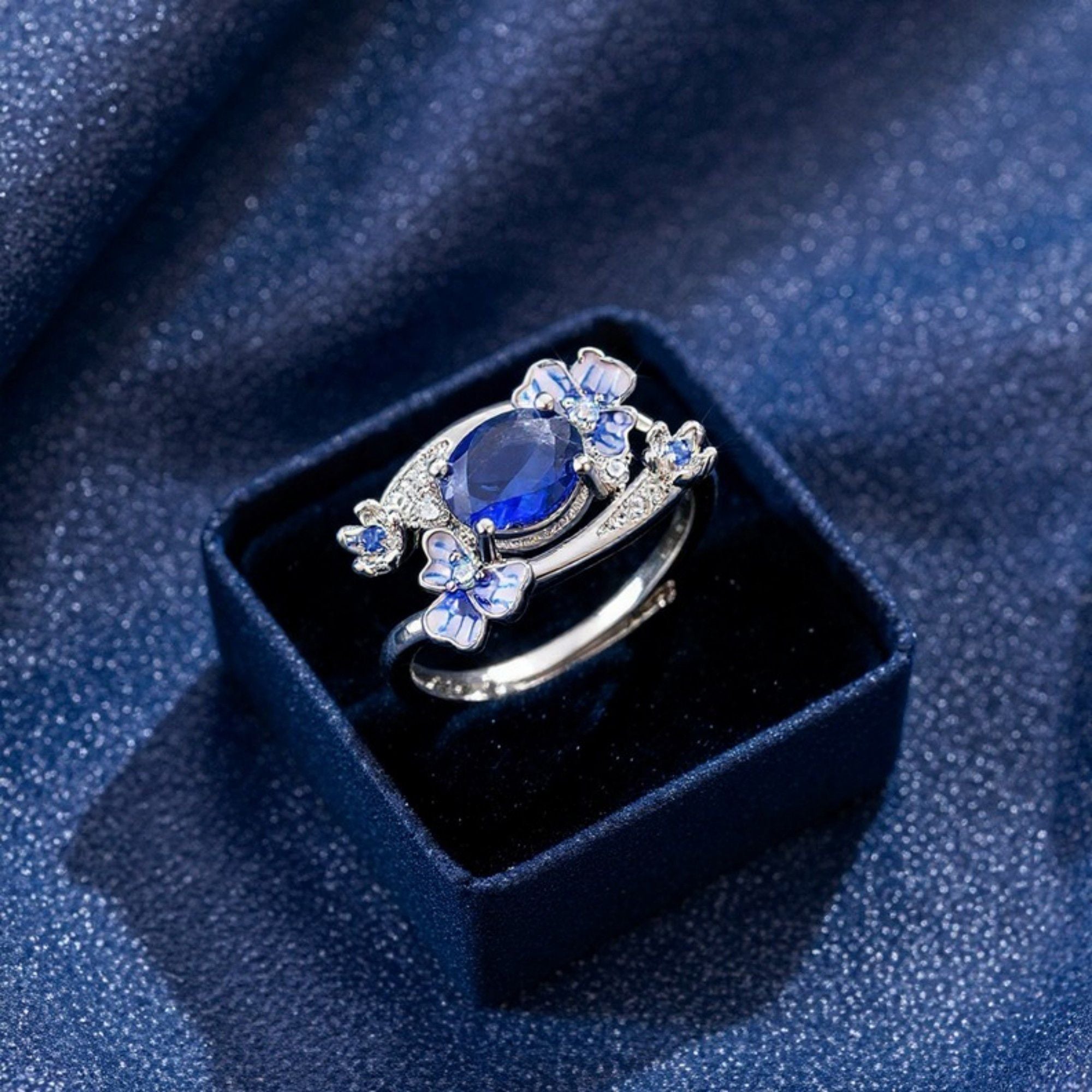 Women's Oval Gemstone Ring with Crystal Butterfly Accents and Floral Design