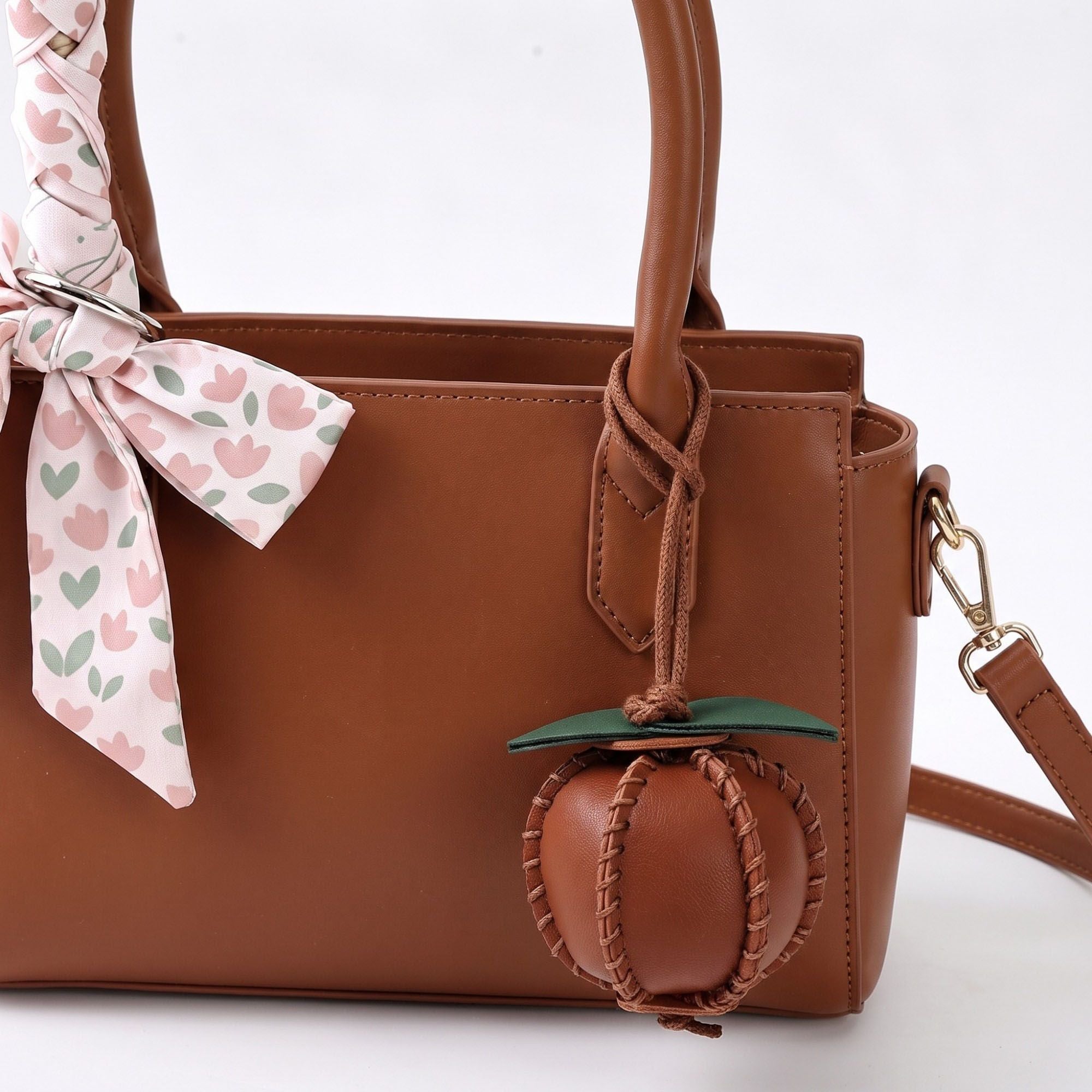2-Piece Womens Faux Leather Bag Charm with Cord Loop Leaf Accent and Textured Stitch Detail