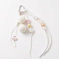2-Piece Multi-Element Bag Charm with Hanging Strap and Decorative Accents