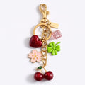 Cherry Clover Flower Bag Charm Keychain with Heart and Dice Pendants