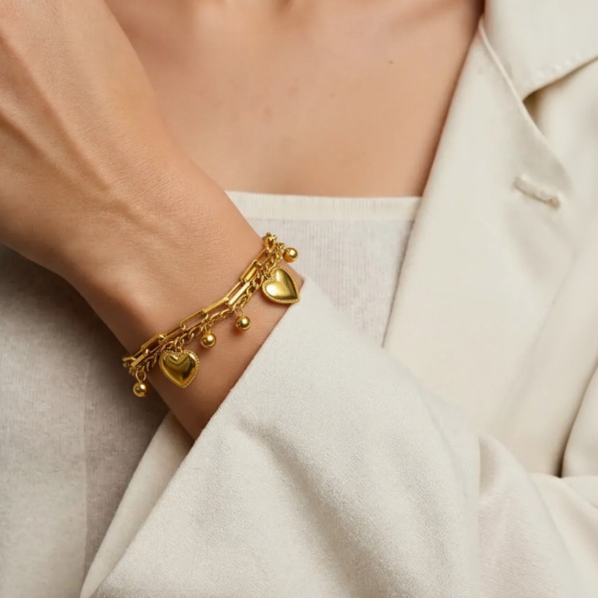 Layered Chain Bracelet with Dual Heart Charms and Dangling Bead Accents for a Playful Feminine Accessory with Modern Detail