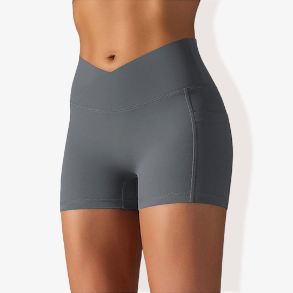 Pantalones cortos deportivos ajustados con cintura alta, bolsillos y banda en la cintura en forma de V