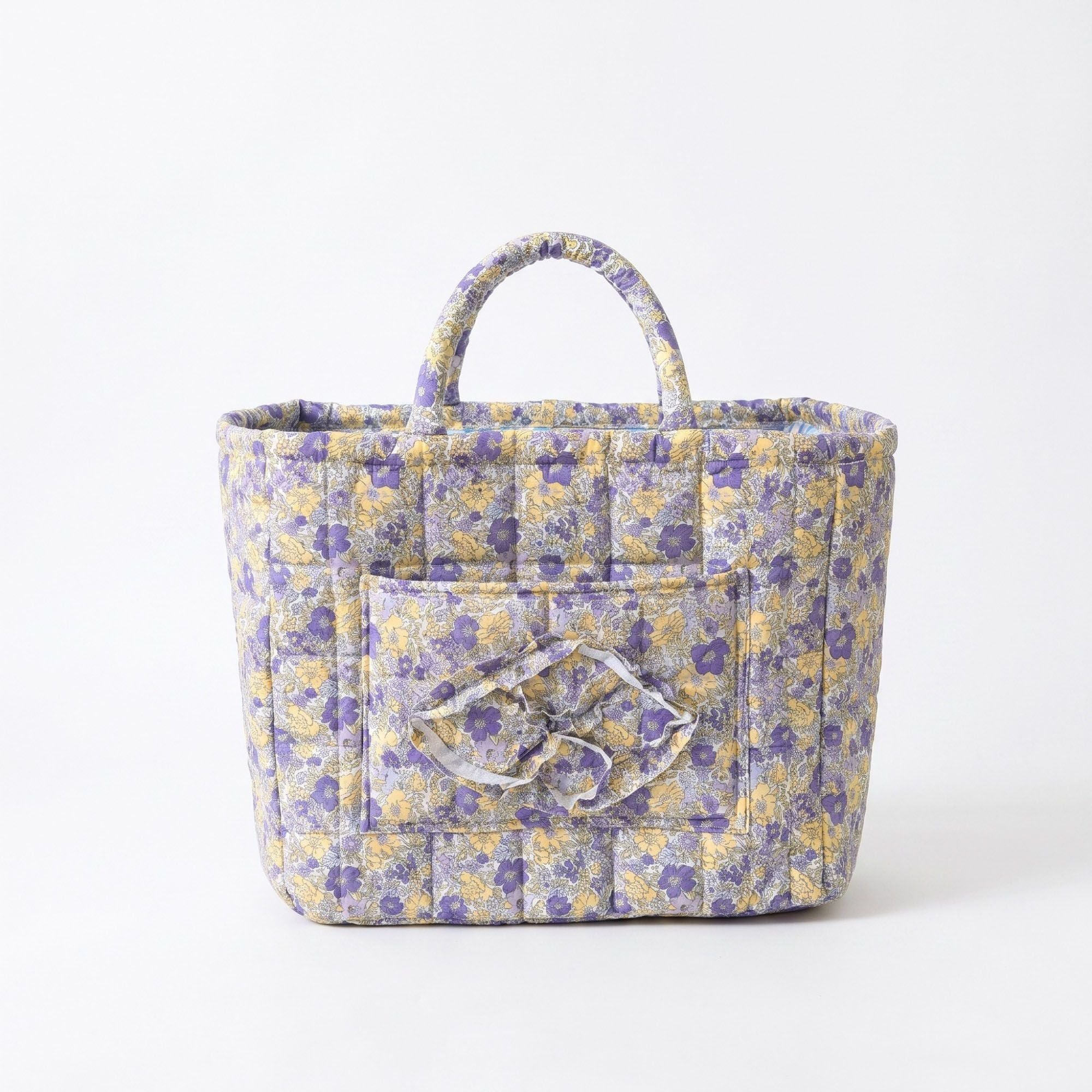 Bolso floral acolchado para almacenamiento con asas y bolsillo frontal