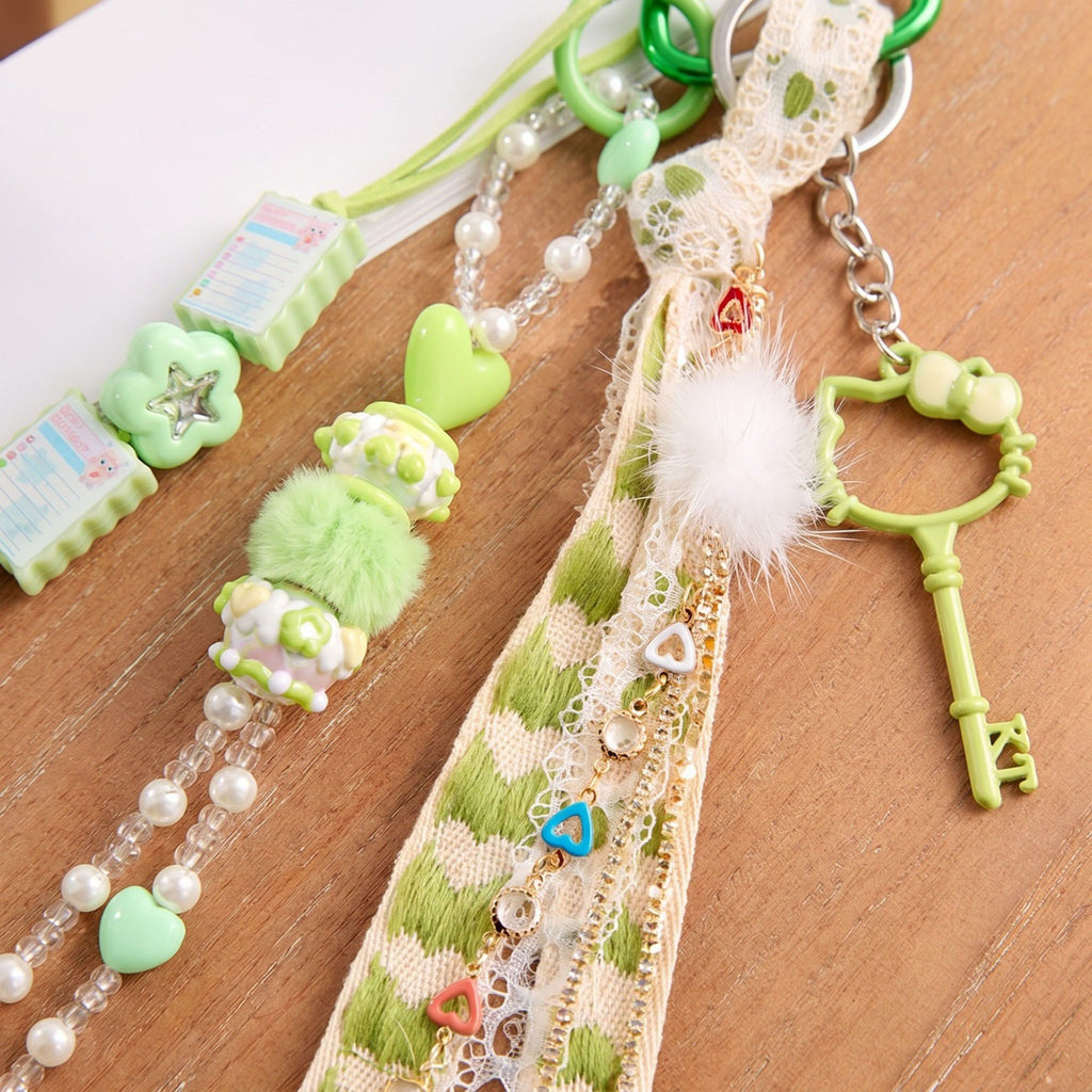 Multi-Element Bag Charm with Hanging Strap and Decorative Accents