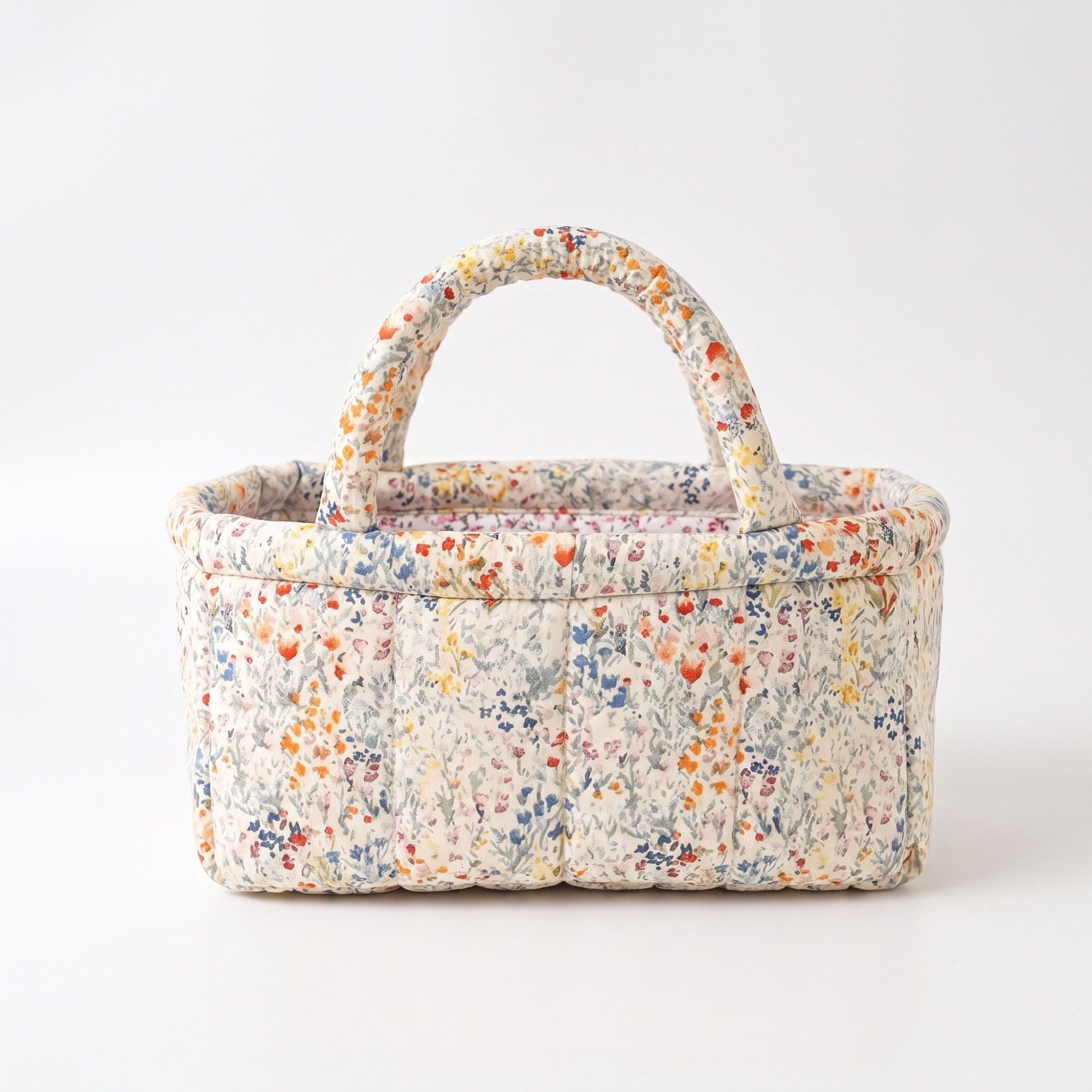 Cesta acolchada floral con asas para organizar el hogar