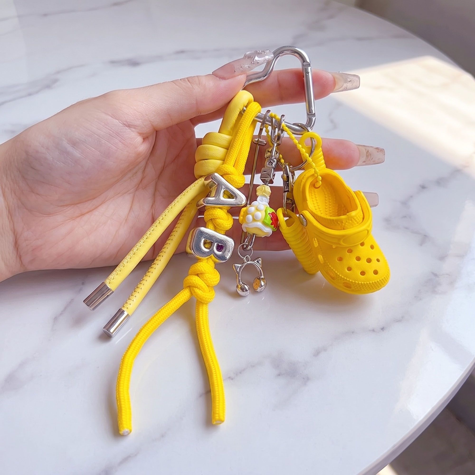 Multi-Charm Accessory with Hanging Clip and Letter Accents