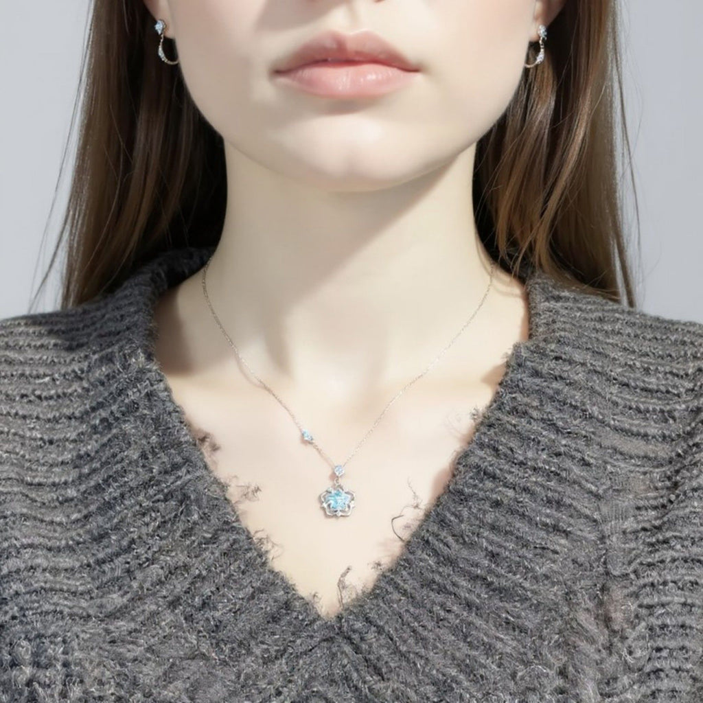 Women's Star Flower Pendant Necklace with Crystal Center Stone and Accent Gem Detailing