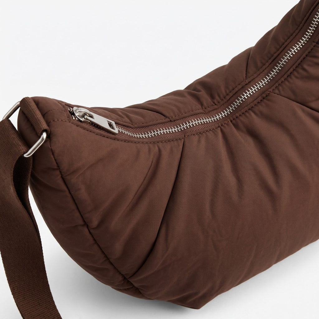 Padded Crescent Shoulder Bag with Wide Strap and Top Zipper Closure 13x7.5x2.5in