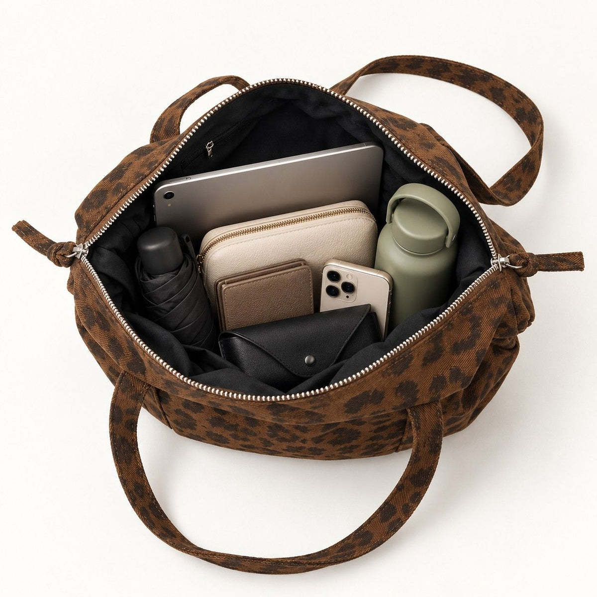 Leopard Print Barrel Shoulder Bag with Zip Closure and Interior Pockets