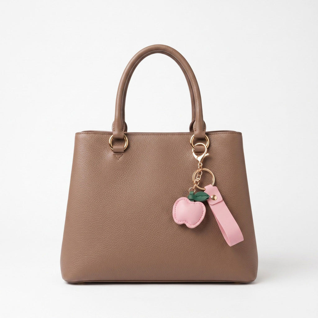 Apple Bag Charm with Faux Leather Strap and Gold Tone Hardware