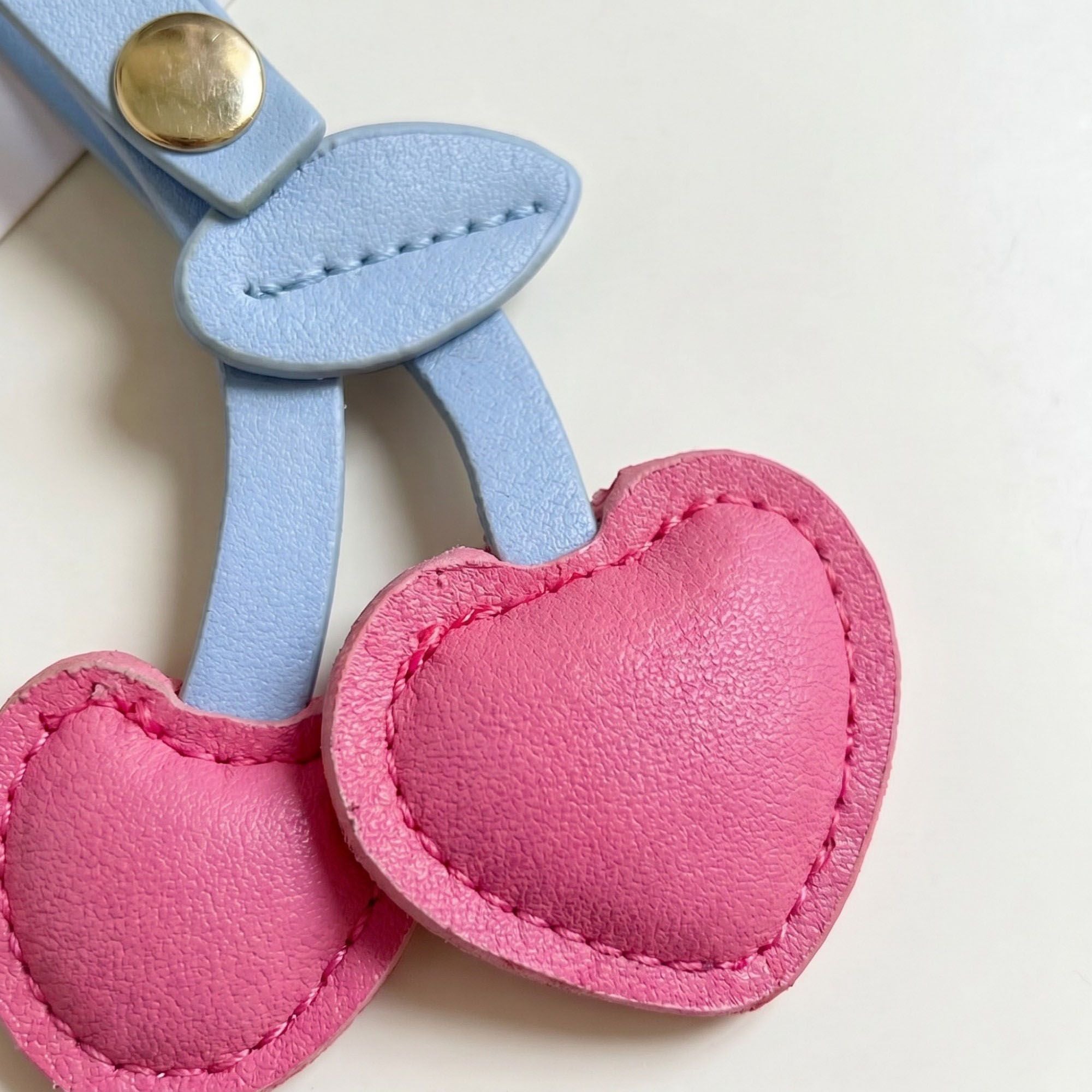 2-Piece Womens Padded Bag Charm with Hanging Strap and Stitched Detail